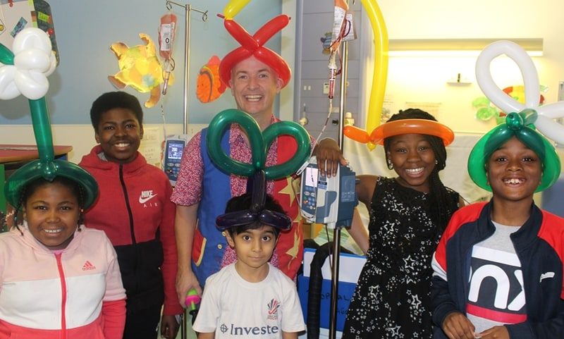 Skittleman entertaining young haematology patients