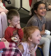 Children laughing at a Pod show