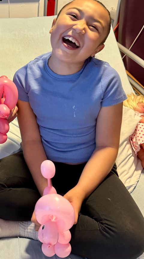 Laughing child in hospital