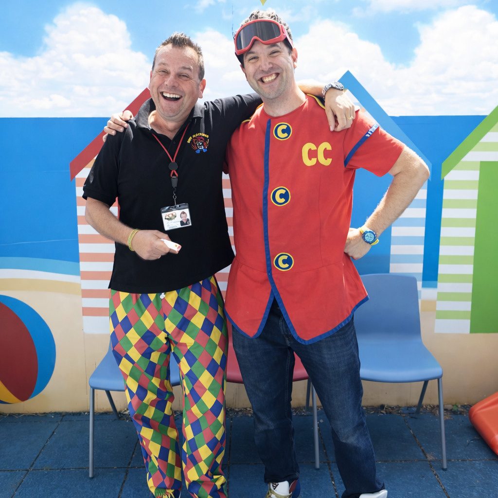 Two Pod entertainers (Colonel Custard and colleague) smiling together